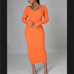 Orange Sweater Dress. This dress has a great stretch.